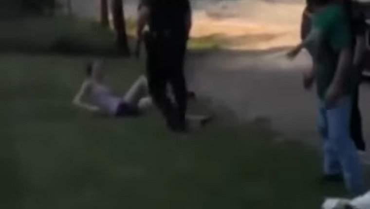 woman-arrested-stop-police-shooting-dog-3