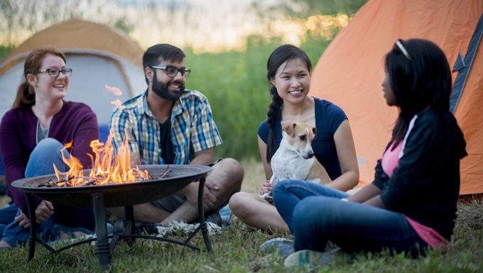 campers with their dog