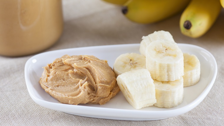 Early Morning Healthy Breakfast. Homemade peanut butter and bananas.