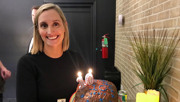 katie with 10 year anniversary cake