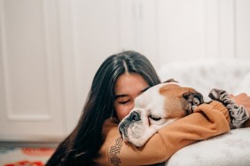 female taking care of her dog