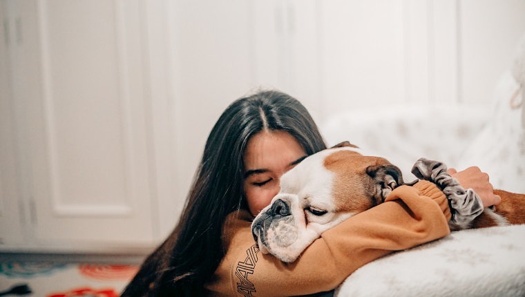 female taking care of her dog