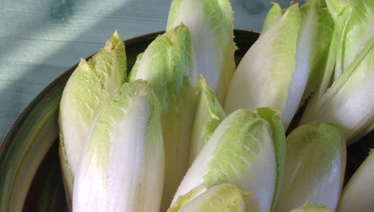 Fresh, crunchy Belgian endive in a bowl.