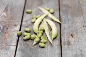 Still life of lima Beans (also known as butter beans) on wooden table