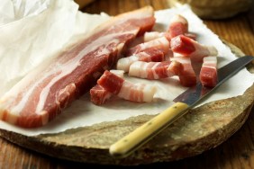 Pancetta on vintage chopping board