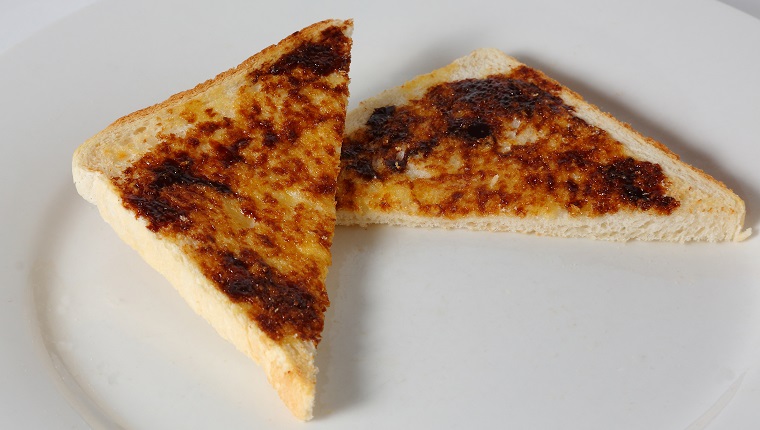 Vegemite toast cut into triangles.