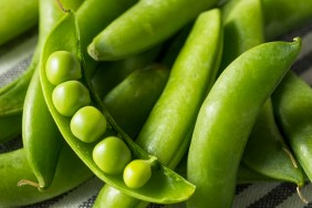 Raw Green Organic Snap Peas in a Bowl