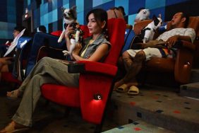 people and pets at first pet-friendly movie theater in Thailand