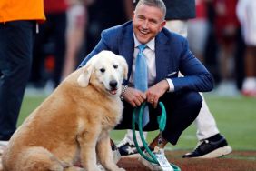 Football analyst, Kirk Herbstreit, with his dog, Ben, who recently passed away due to cancer, before the college football game between the Tennessee Volunteers and Arkansas Razorbacks on October 5, 2024, at Donald W. Reynolds Razorback Stadium in Fayetteville, Arkansas.