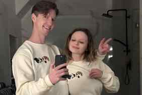 Joey King and her husband wearing tees with their dog’s faces.