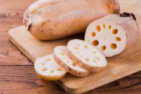 Lotus root chopped on a cutting board.