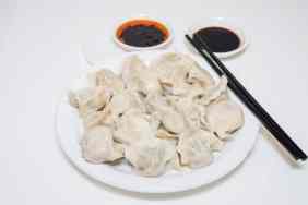 Dumplings isolated on white table.
